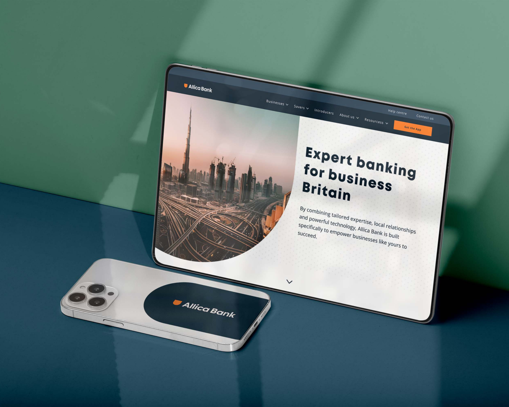 Graphic of a typography specimen showing the alphabet and numerals on top of a dark gray background.